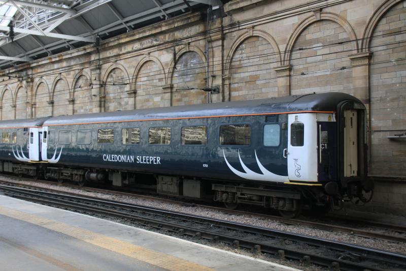 Day coach 6701: Day coach 6701 in the new livery ( the ends have not been painted) stabled in Waverley on 08/04/2015. Photo of Day coach 6701