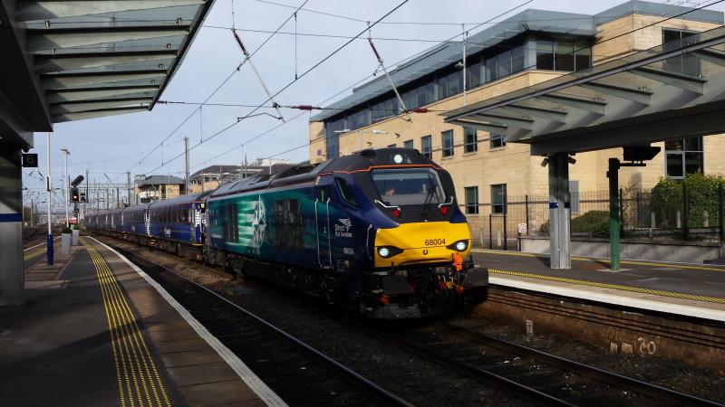 Haymarket Greeting: A Class 68 rumbles into Haymarket with a rake of Scot-Rail coaches on the morning of Monday, 13 April - I have pictures of 67s doing the same job just recently! Photo of Haymarket Greeting