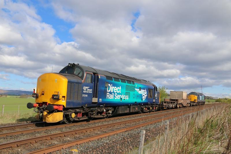 6S99 from Carlisle Kingmoor to Georgemas Jn: 37605 TnT 37218 heading north with a toot & a wave Photo of 6S99 from Carlisle Kingmoor to Georgemas Jn