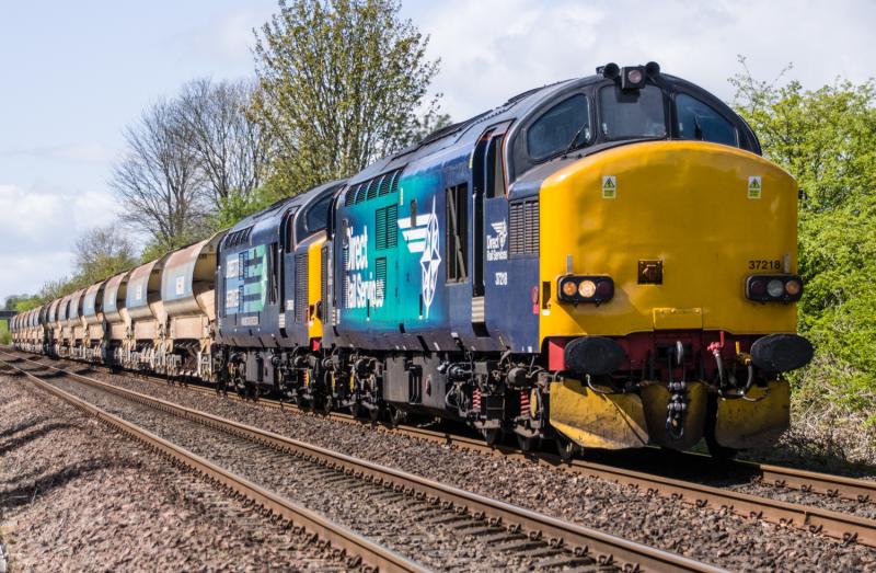 37218/37605.: 37218 with 37605 head north with a ballast train at Forgandenny 04/05/15
Photo of 37218/37605.