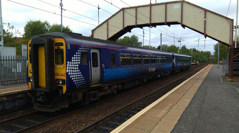156 442 at Holytown: 156 442 rests at Holytown on a stopping service between Edinburgh and Glasgow Photo of 156 442 at Holytown