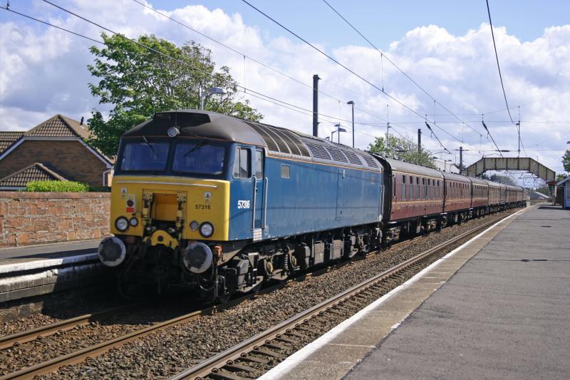 WCRC 57316 on rear of 5Z81 empty SRPS stock from Boness to Falkland yard at Prestwick Town on 05-06-15.jpg: Photo of WCRC 57316 on rear of 5Z81 empty SRPS stock from Boness to Falkland yard at Prestwick Town on 05-06-15.jpg