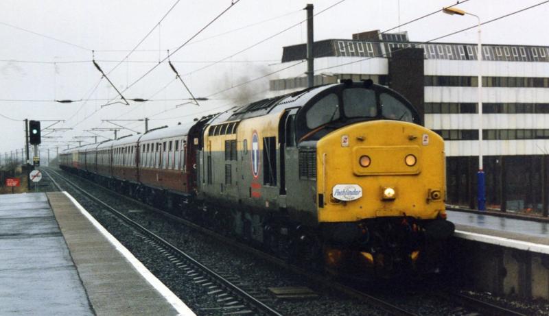 Pathfinder to Ayr: I posted a pic of BLUE PETER working this train through Kilwinning in March 1997 in the Steam section. This is the train now in charge of 37153 heading through Irvine for Ayr. Photo of Pathfinder to Ayr