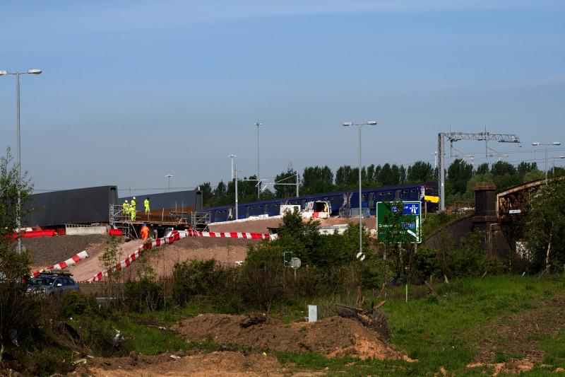 320s at Bargeddie: 2 unidentified class 320 pass the site of the new bridge over the M8 extension in June 2015 Photo of 320s at Bargeddie