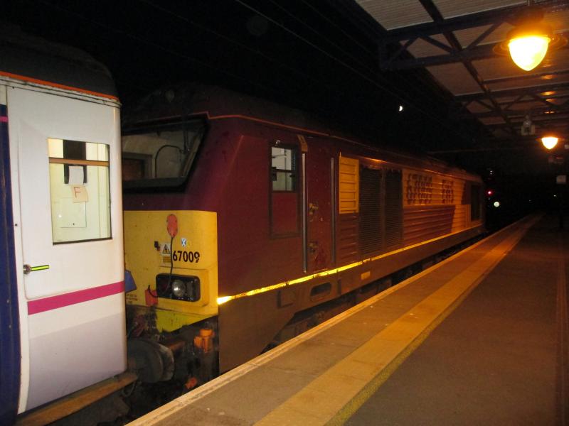 EWS liveried Class 67#67009 Dumbarton Central 23 June 2015: Euston bound sleeper at Dumbarton Central on 23 June 2015 with Class 67 #67009 on rear. Hauled by Class 37 #37516 Photo of EWS liveried Class 67#67009 Dumbarton Central 23 June 2015