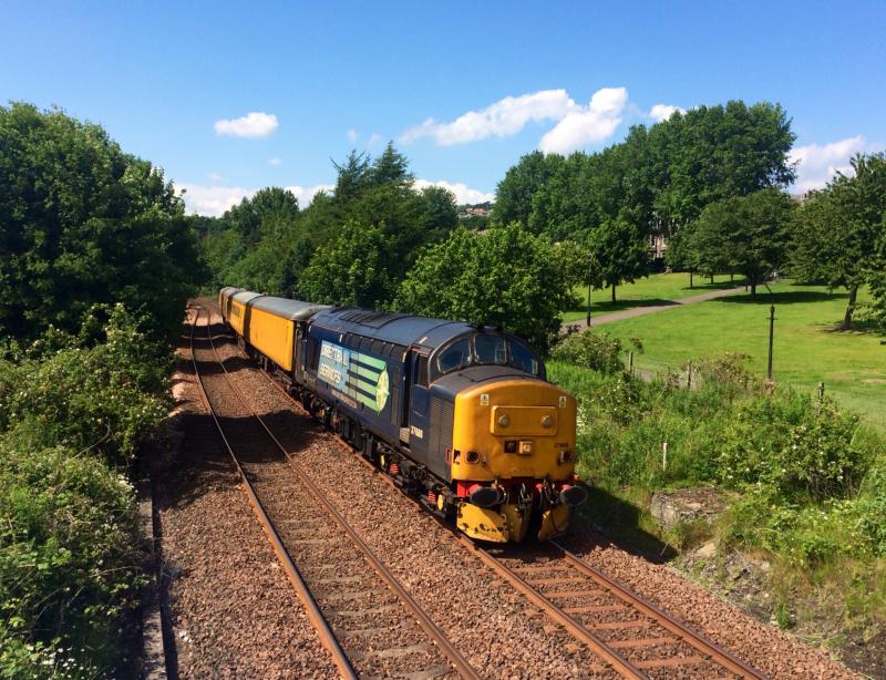 37688 3Z05 030715 Magdalen Green:
37688 passes Magdalen Green approaching Dundee with 3Z05 Carlisle High Wapping Sidings to Aberdeen Clayhills transit move for a NR test train on 3rd July 2015 Photo of 37688 3Z05 030715 Magdalen Green