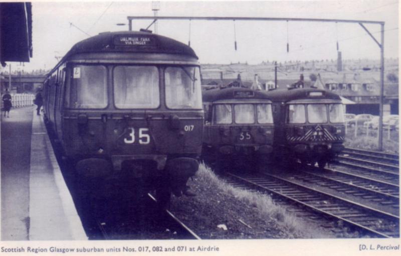 Class 303s at Airdrie: An early line up at Airdrie with 071 having the experimental yellow and black chevron panel Photo of Class 303s at Airdrie