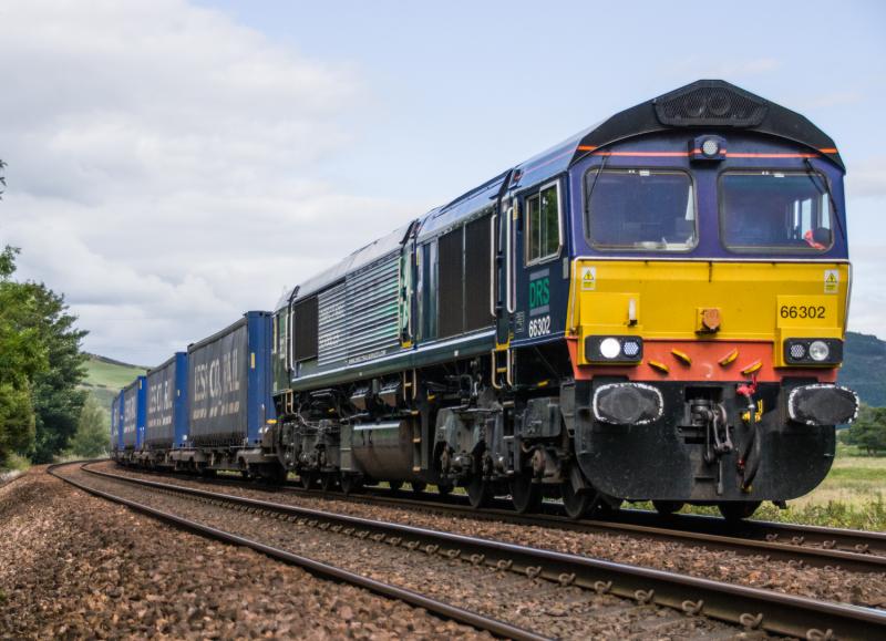 66302: 66302 heads south with 4D47, seen passing Forgandenny. 03/08/15. Photo of 66302