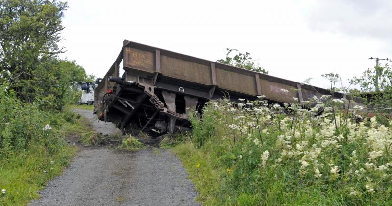 This is not a RRV: MTA 395159 has a miserable attempt at trying to become an RRV
Picture taken at Palquhap Crash scene Wed 5th Aug 2015 when 66428 pushed it of the track & across farm road Photo of This is not a RRV