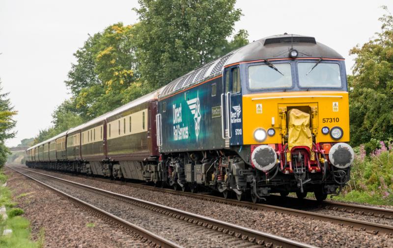 57310: 57310 with 5Z70 passes Forgandenny. 57305 is on the rear. Photo of 57310