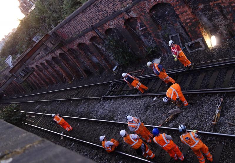 Dundee aftermath: A chap from work pushed his camera over the wall after the derailed CWR train at Dundee had been rerailed and removed. Photo Ross Garnier Photo of Dundee aftermath