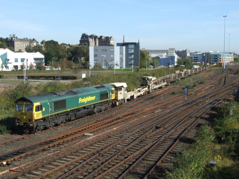 Dundee derailment: The rerailed CWR train sits in the sidings at Dundee minus its load of rails. Freightliner 66603 at head and Colas 56078 at tail. Picture taken 30th September 2015. Photo of Dundee derailment