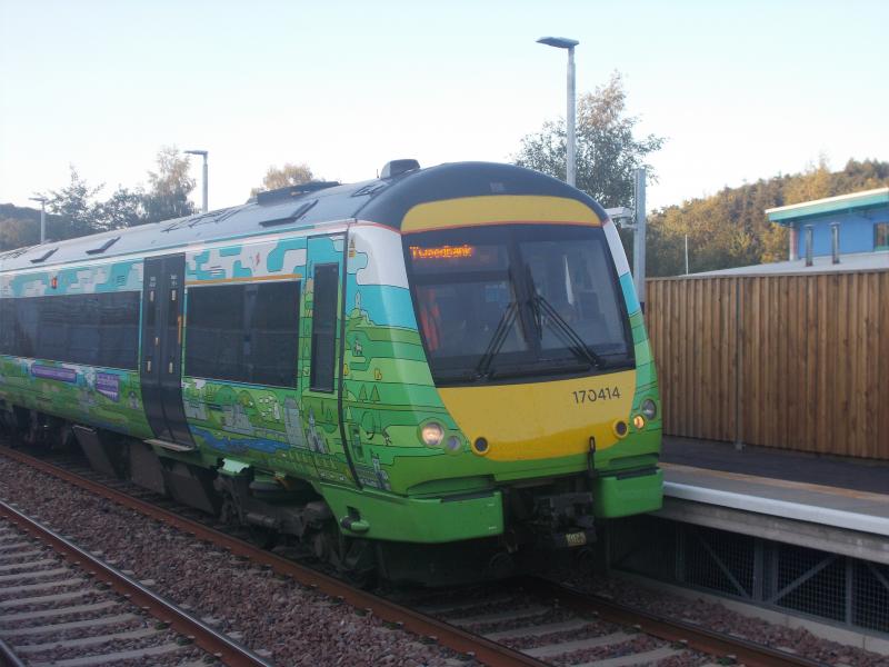 170414 at Stow : 170414 rare to see this trains as it's the only one in the borders railway livery I think. Photo taken on the day the borders railway opened to the public. Photo of 170414 at Stow