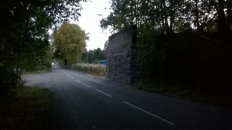 Old bridge abutment in Rothes: Old bridge abutment on B9015 in Rothes - nothing left across the road! Elgin to the right, Rothes station and Craigellachie to the left. Photo of Old bridge abutment in Rothes