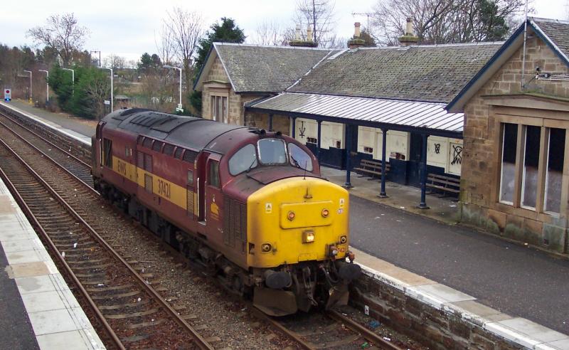 37421 LE at Tain: 21st January 2004 - on it's way up to Lairg to collect the empty Oil tanks. (They stayed overnight there in those days - when Inverness had daily freight trains.) Photo of 37421 LE at Tain