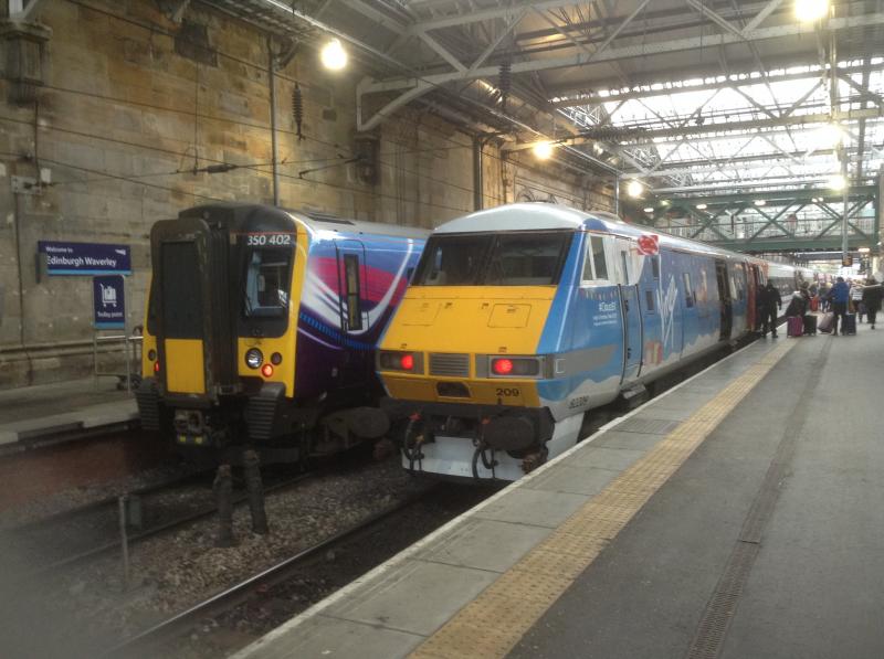 Class 91: Xmas coloured 91128 at Waverley on 4/12/15 Photo of Class 91