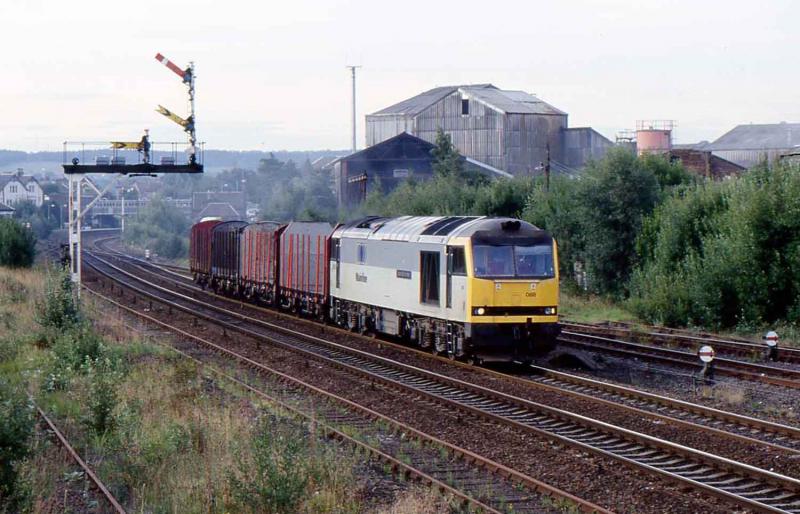 60088 at Larbert with empty OTAs for Perth.jpg: 60088 runs north through Larbert with empty OTAs from Mossend to Perth. Photo of 60088 at Larbert with empty OTAs for Perth.jpg