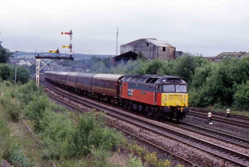 Photo of 47767 goes north at Larbert on29 June 2002 with a Green Express Railtour from Newcastle to Inverness.jpg
