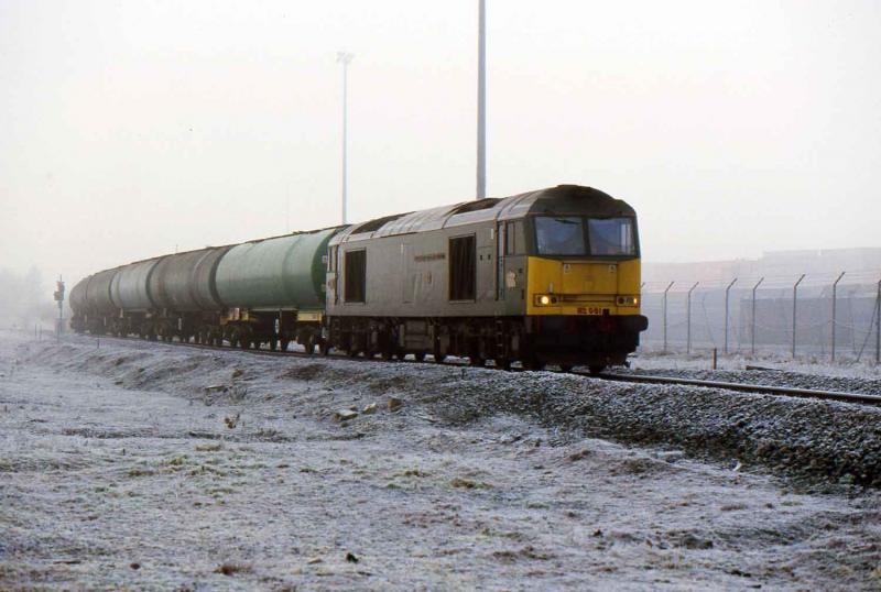 Photo of 60081 on the Oil Terminal Branch in Grangemouth Docks with the empty tanks from Dalston on a cool winter day.jpg