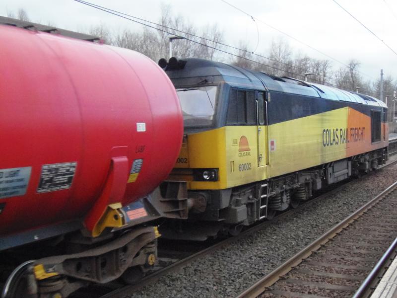 60002: A different angle on the Dalston empties through Lochwinnoch 6th Jan Photo of 60002