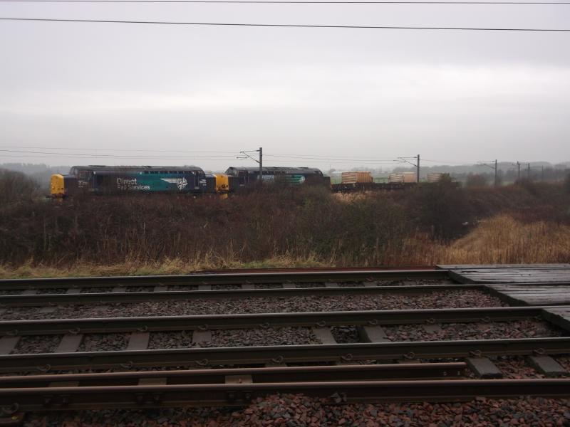 Hunterston nukes: 37716 leads 37602 at Byrehill Jn, Kilwinning on Hunterston - Kingmoor nukes 20/1/16 Photo of Hunterston nukes