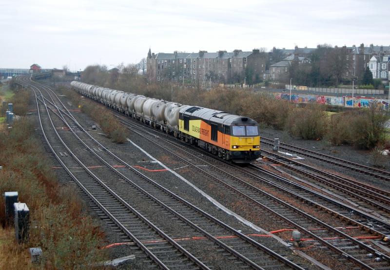 60021 Dundee Central Junction: Colas 60021 passes the site of the former diesel depot at Dundee as it approaches with 6A65 Oxwellmains - Aberdeen Craiginches cement.
20/1/2016 Photo of 60021 Dundee Central Junction