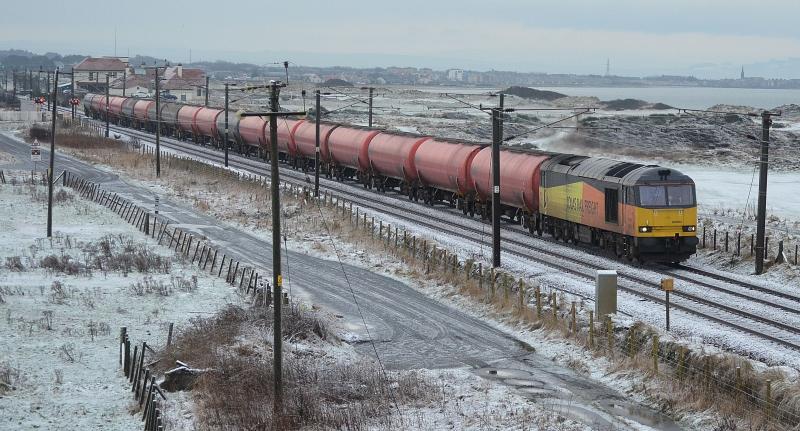 Tug, tanks & tundra: A diverted 6S36 Dalston-Grangemouth negotiates the froxen wastes of Gailes LC
Photo of Tug, tanks & tundra