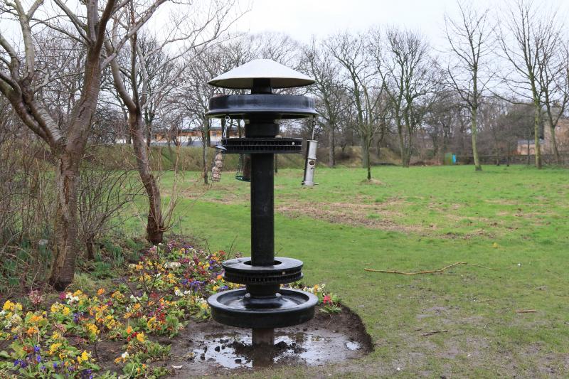 Wheel Birdtable: Unusual Birdtable in the Figgate Park near Craigentinny T & RSMD made from a scrap wheelset. Photo of Wheel Birdtable