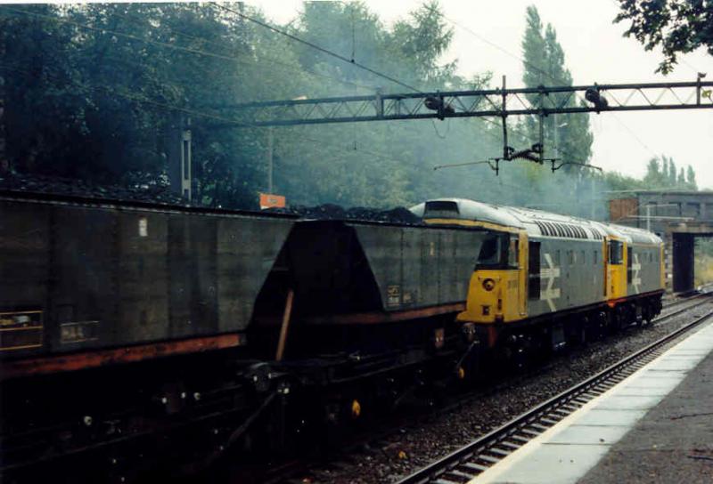 26001/ 26006: Haymarket based Class 26 locos heading through Scotstounhill with loaded coal hoppers en route from Rothesay Dock, Clydebank to Longannet Power Station in Fife in 1988. Photo of 26001/ 26006