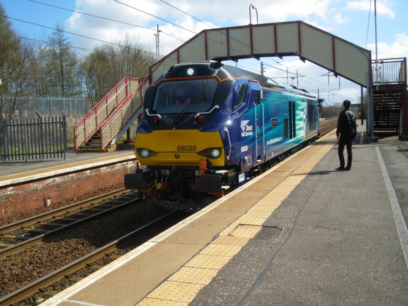 68020 at Holytown: Seen 18/04/16 running light engine from Carlisle to Motherwell Depot, passing through Holytown station. Photo of 68020 at Holytown