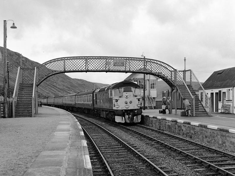 26046: 26046 brings the combined 11.48 ex Thurso/11.45 ex Wick into Helmsdale on 30 June 1980. Photo of 26046