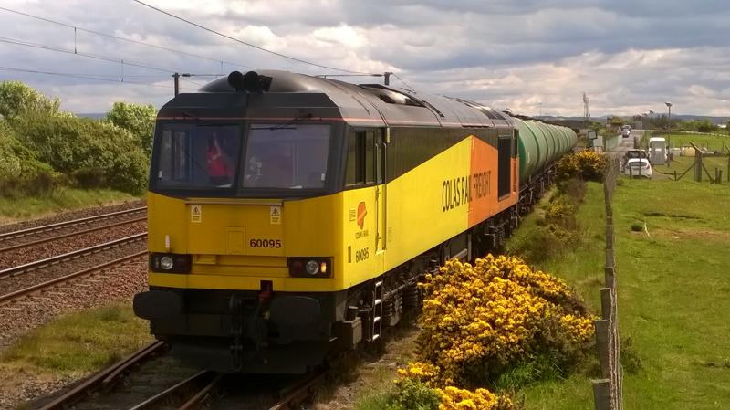 Early Avgas: 60095 departs Prestwick Airport avgas terminal early with a smaller rake of tanks working to Grangemouth. 1315 24th May 2016 Photo of Early Avgas