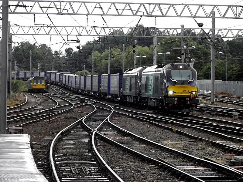 68018 and 68005: 68018 leads 68005 with the Northbound Tesco Intermodal 4S43 from Daventry to Mossend, arriving at Carlsile on Saturday 2nd July 2016 Photo of 68018 and 68005