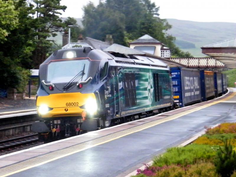 'Intrepid' through Gleneagles @ 05.38 - 08 July 2016: Powering northwards with all running lights blazing, in the rain, at 05.38, with the Tesco intermodal freight, to Inverness Photo of 'Intrepid' through Gleneagles @ 05.38 - 08 July 2016