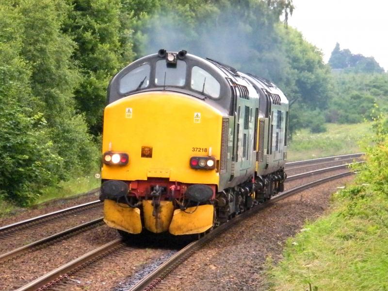 37218 & 37688 @ Gleneagles - 09 July 2016: Powering south, at 14.14, in the rain, '0Z38', from Inverness to Carlisle, running 24 minutes late. Photo of 37218 & 37688 @ Gleneagles - 09 July 2016