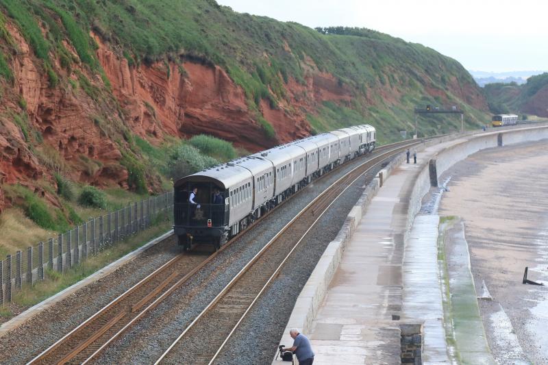 1Z79 approaching Langstone Rock: rear view of 1Z79 04.35 Gloucester to Bath on the sea wall at Dawlish. Verandah at the rear.Have the rules changed south of the border for this train? Photo of 1Z79 approaching Langstone Rock