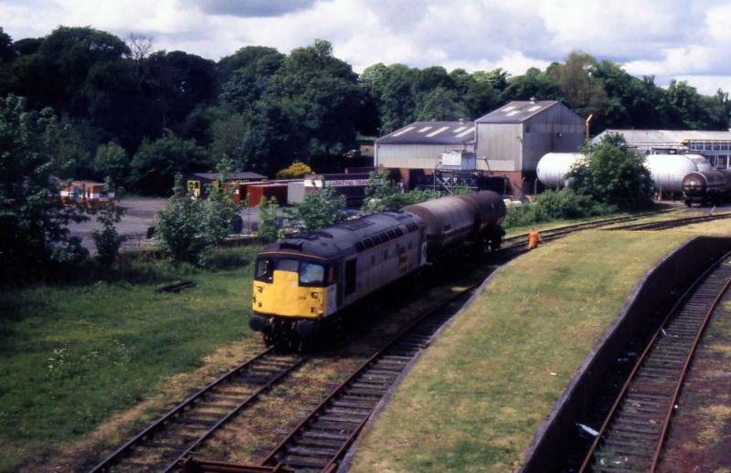 Cameron Bridge -- 1991: A class 26 shunts carbon dioxide tanks at Cameron Bridge sometime in 1991. Photo of Cameron Bridge -- 1991