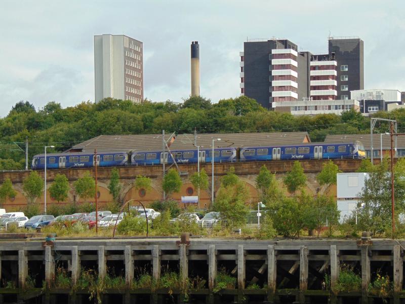 320314 at Finnieston: 320314 passes Finnieston with the 2F41 08:25 Motherwell to Milngavie on Sunday 14th August 2016. Photo of 320314 at Finnieston