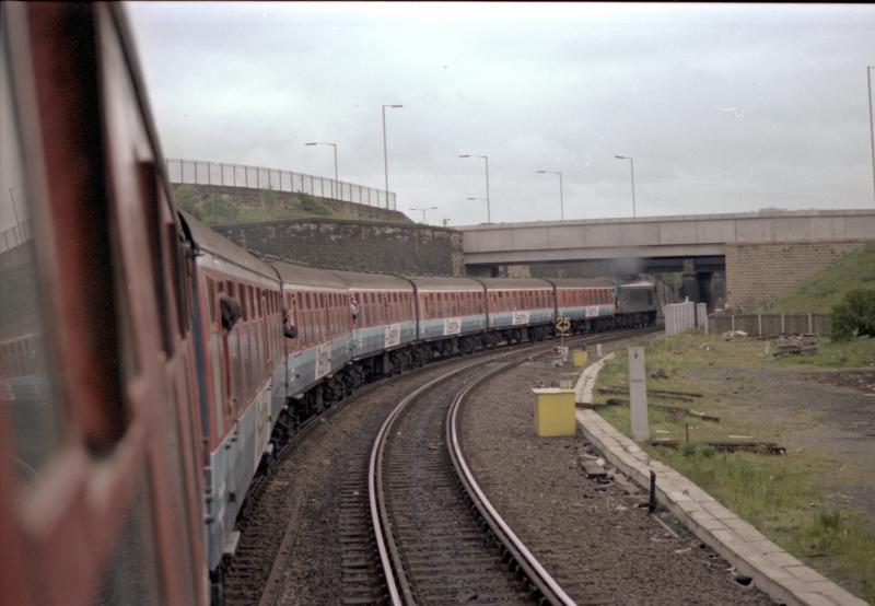 45148 with Sealink stock: Following discussion here on the Tayrail explorer to Derby and Toton on 13 May 1986, Iain Smith has kindly supplied this tour pic of 45148 and the Sealink rake heading south from Newcastle. Photo of 45148 with Sealink stock