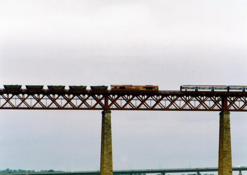 A meeting over water.......: 66026 heading North presumably for Longannet about to pass a Southbound 150 on the Bridge in September 2004. Photo of A meeting over water.......