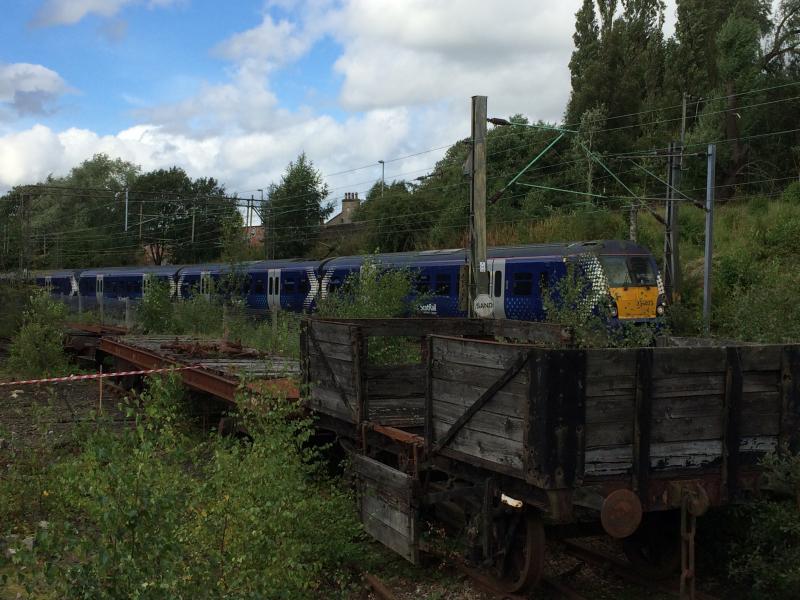 Photo of 334023 & 334009 approaches Coatbridge Sunnyside