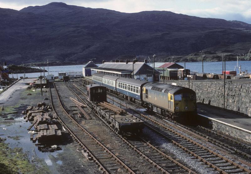 26034 at Kyle: 26034 waits at Kyle at head of 11.10 service to Inverness. 24/9/1983 Photo of 26034 at Kyle