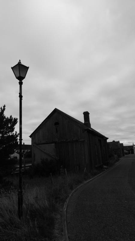 Brora Goods Shed: The original wooden Highland Railway goods shed still stands in fairly good condition. Photo of Brora Goods Shed