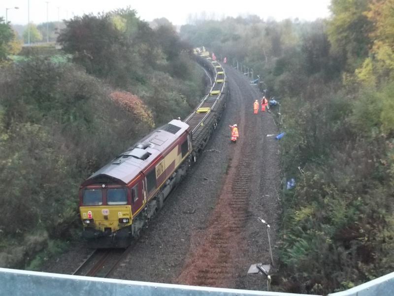 66176 on rear of 6K01: 66176 on the rear of 6K01 2028 Friday Kingmoor to Carmuirs West. Waiting to leave for Larbert with it's loaded rail train on Saturday 29th October 2016. Photo of 66176 on rear of 6K01