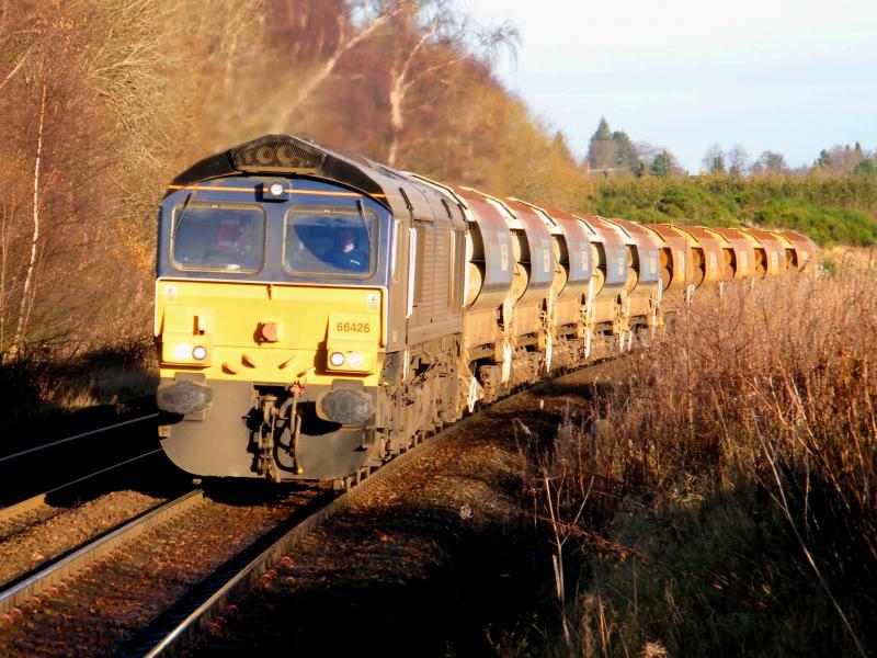 66426 @ Gleneagles - 27 November 2016: Dirt covered 66426 heading to Millerhill, in low winter sunlight, with ten autoballasters, following maintenance to The Highland Line, at Stanley. Photo of 66426 @ Gleneagles - 27 November 2016