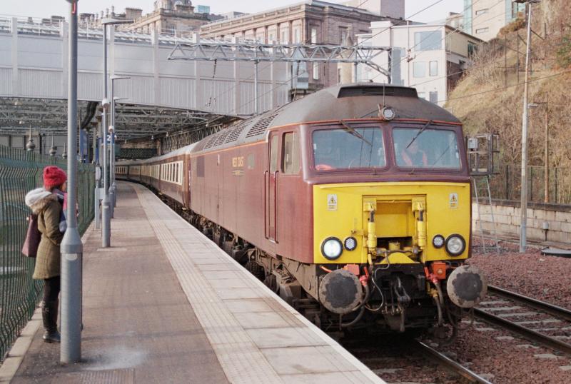 57316 leaving Edinburgh Waverley: Class 57 No. 57316 hauling West Coast railtour coaching stock back to Craigentinny, 10th December 2016, observed by the mrs. Photo of 57316 leaving Edinburgh Waverley