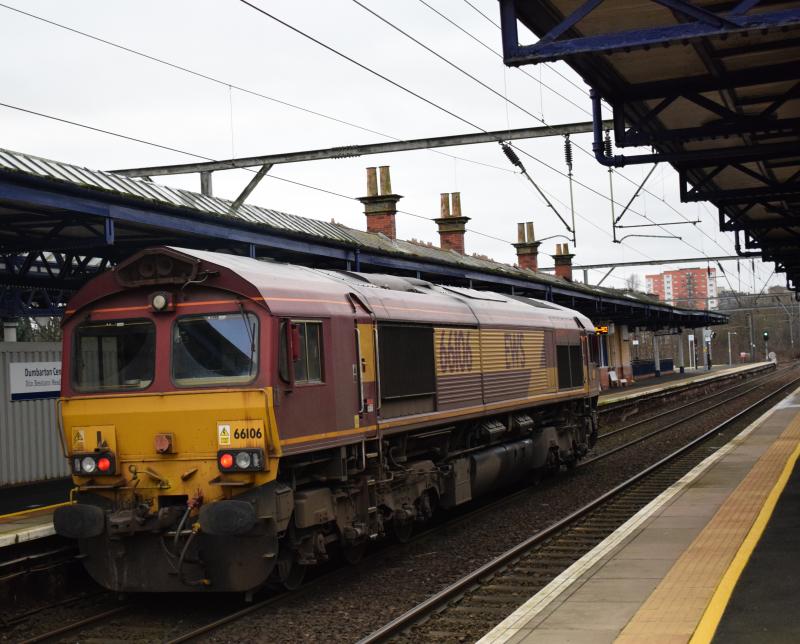 Mossend - Glen Douglas 19 Jan 2017: Rear view of EWS liveried Class 66 #66106 running some 4 mins late at Dumbarton Central. Photo of Mossend - Glen Douglas 19 Jan 2017