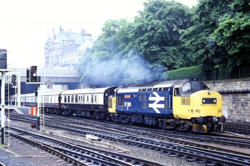 Royal Scotsman departs: 37260 Radio Highland leaving Waverley in June 1986 with the Royal Scotsman. Photo of Royal Scotsman departs