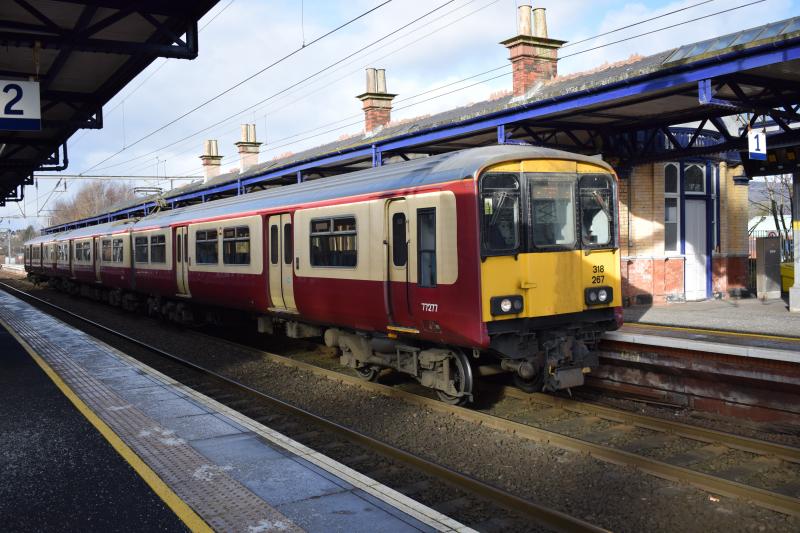 Class 318 #318267 Dumbarton Central 2 March 2017: 318267 still in old carmine and cream livery on Balloch - Airdrie service at Dumbarton Central. Photo of Class 318 #318267 Dumbarton Central 2 March 2017