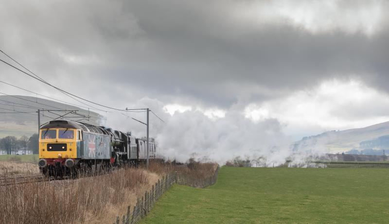 Scots Guardsman: Not sure whether diesel or steam but 46115 being heavily assisted by class 47 just beyond Wandel on run to Edinburgh on 11.3.17. Diesel went on at Abington. Photo of Scots Guardsman